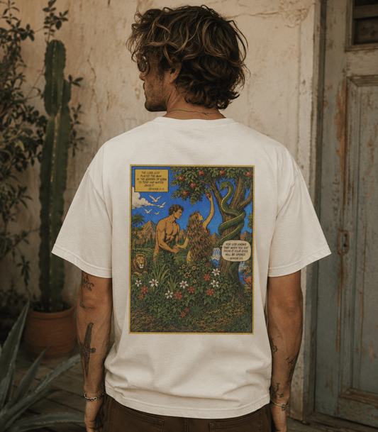 A man viewed from behind wearing a white t-shirt with a large, colorful graphic print on the back depicting a mythological scene of a man and a lion in a garden.