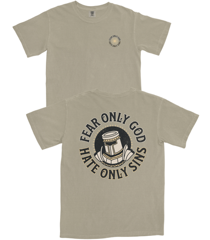 A light khaki-beige t-shirt shown from both the front and back. The front features a small circular graphic on the left chest, while the back displays a large circular graphic with the text 'FEAR ONLY GOD HATE ONLY SINS' surrounding an illustration of a sword and book.