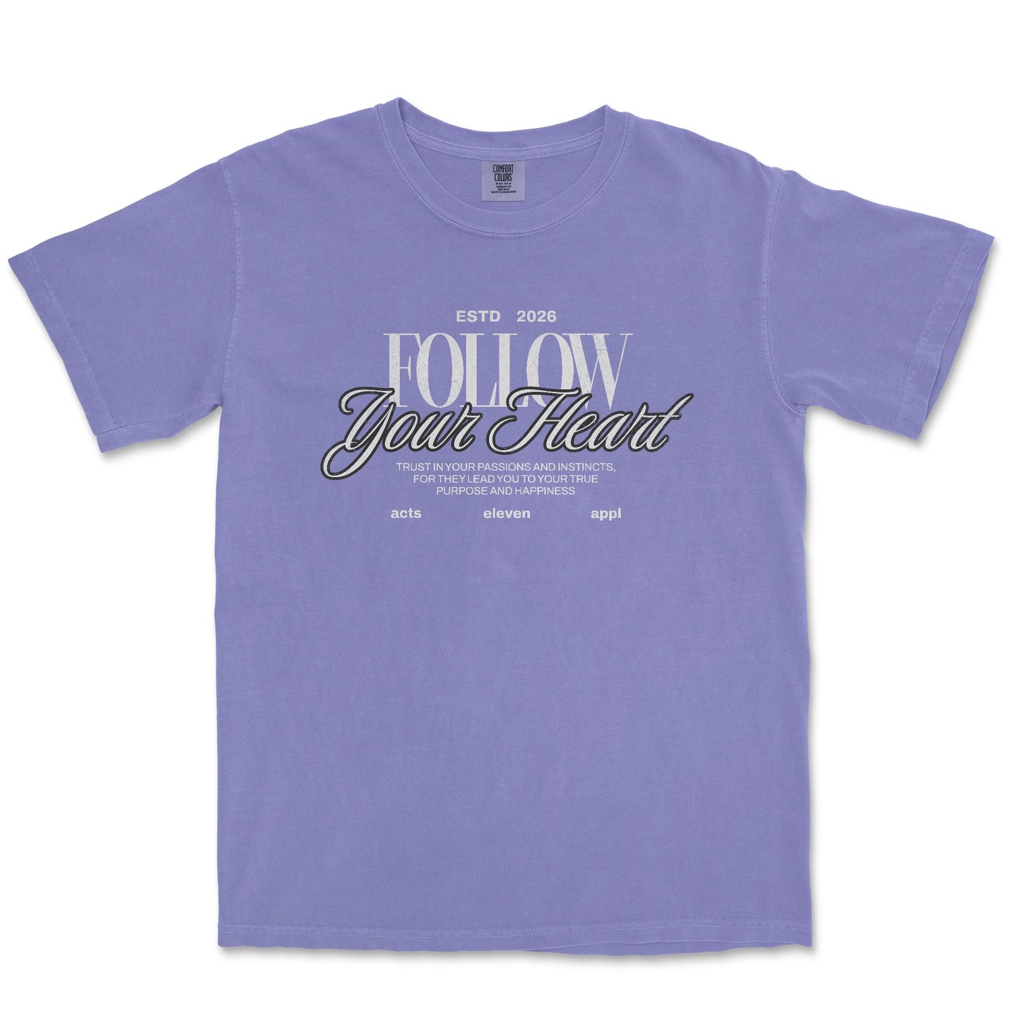 A lavender purple short-sleeve t-shirt with a graphic on the chest reading 'FOLLOW Your Heart' in white and black script, displayed flat against a white background.