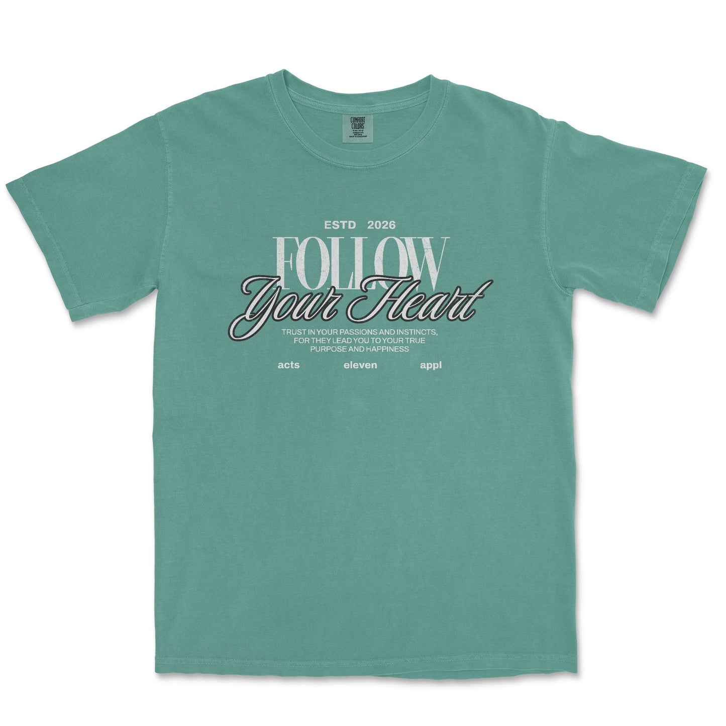 A teal green short-sleeve t-shirt with a graphic on the chest that reads 'FOLLOW Your Heart' in white and black script, displayed flat against a white background.