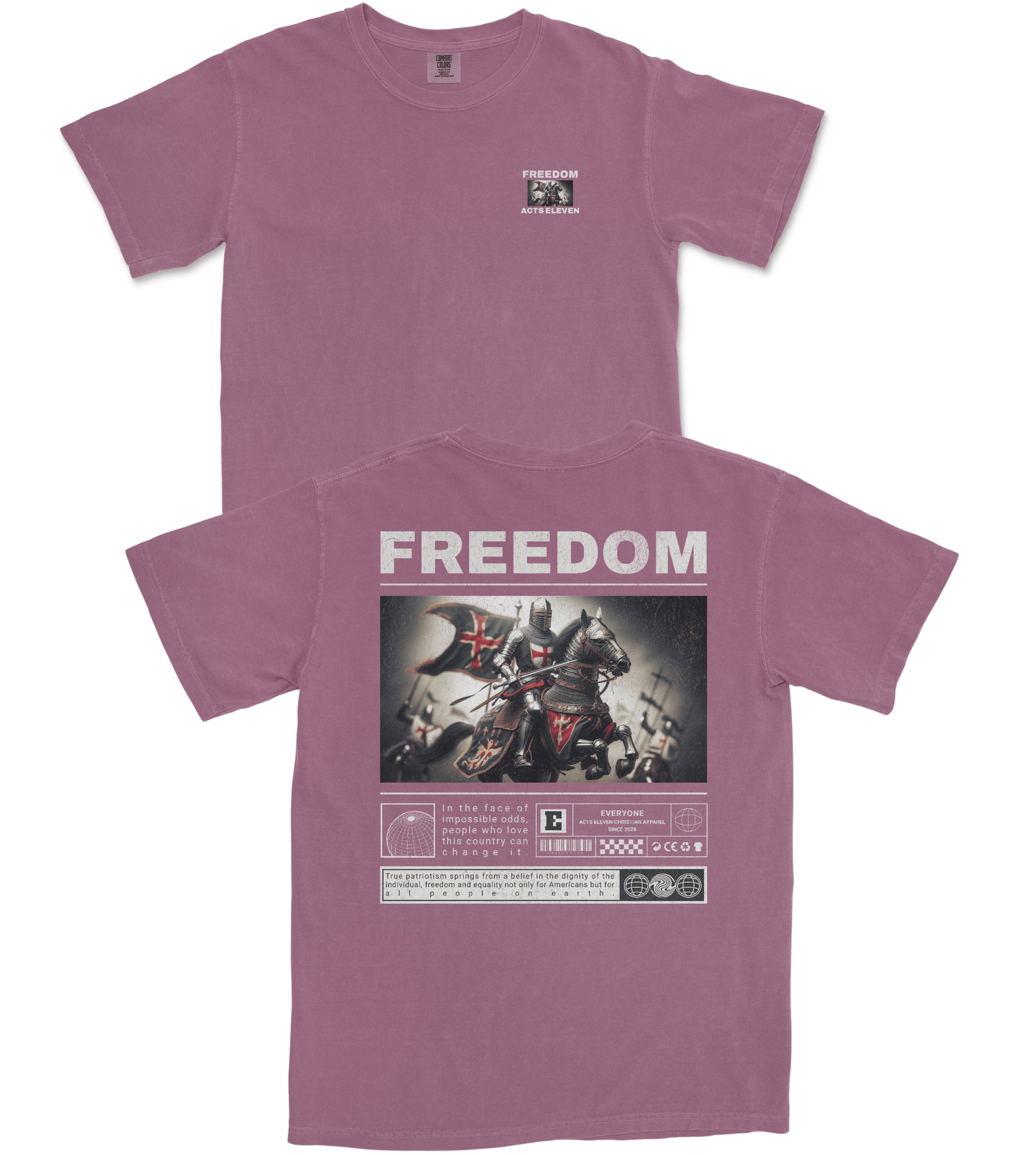 A dusty mauve-purple t-shirt shown from both the front and back. The front features a small square graphic on the left chest, while the back displays a large graphic print with the word 'FREEDOM' in bold white letters above an illustration of a knight on a horse with a red cross, accompanied by technical specification-style text at the bottom.