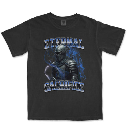 A black short-sleeve graphic t-shirt featuring a knight in dark armor with blue lightning effects and the words 'ETERNAL SACRIFICE' printed in a stylized blue and white font.