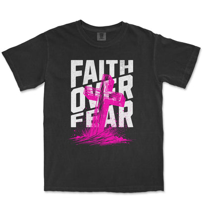 A black short-sleeve t-shirt with a distressed graphic on the front that reads 'FAITH OVER FEAR' in white, overlaid with a bright pink cross and paint-splatter design.